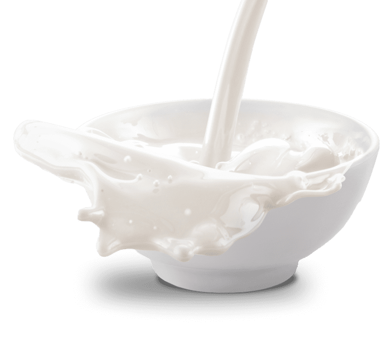 pouring white milk in shape of a bowl